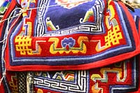 Manangi horses are saddled with Tibetan rugs 